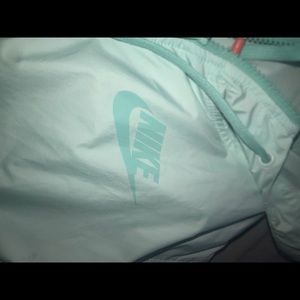 Women’s teal NIKE windbreaker